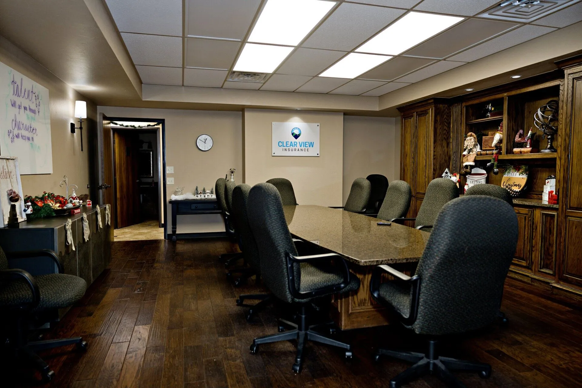 Clear View commercial desk — Erick and team in the conference room